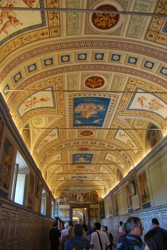 The ornate vaulted ceiling and gallery of the Galleria Clementina inside the Vatican Museums in Vatican City